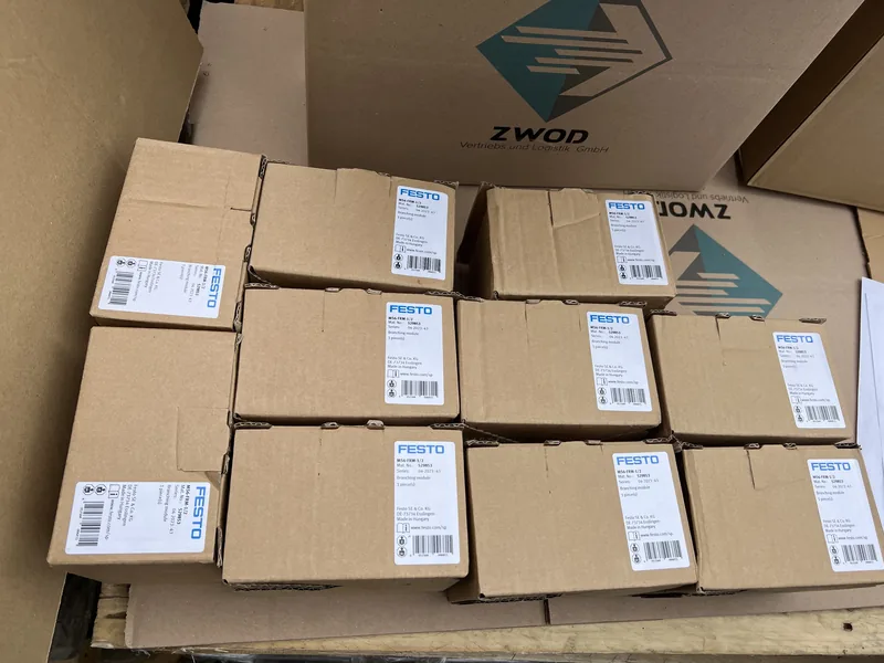 Original-packed Festo cartons in a ZWOD shipping box in the Berlin warehouse